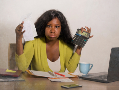 woman frustrated making calculations